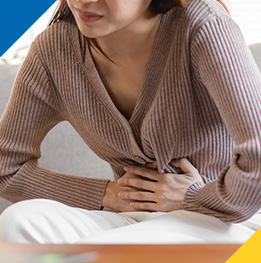 paciente con cancer gastrointestinal manifestando dolor