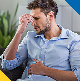 paciente con cancer de colon manifestando dolor